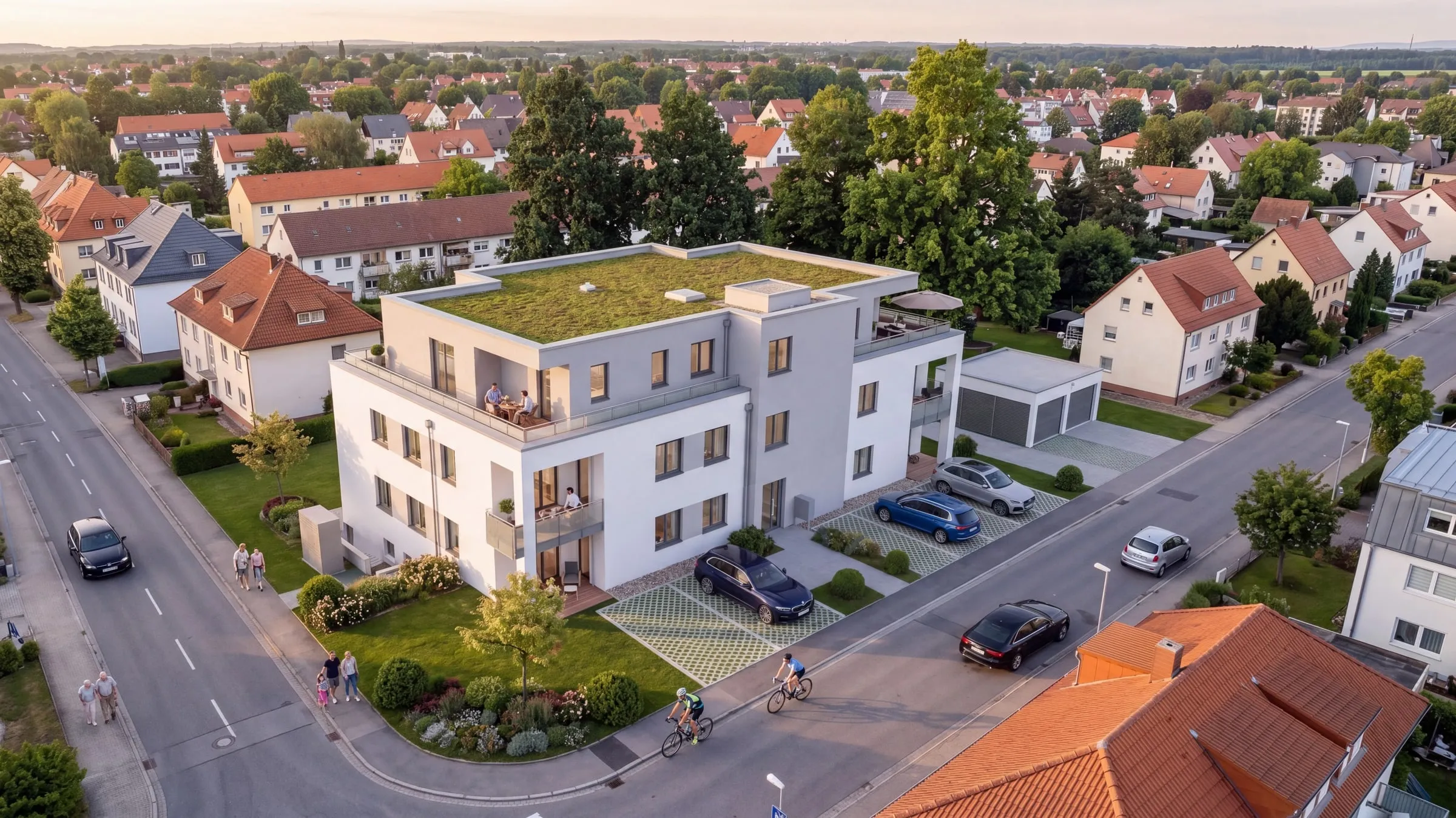 Drohnenbild-Compositing: Mehrfamilienhaus mit Dachbegrünung aus der Drohnenperspektive im Wohngebiet